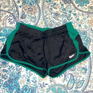 Gray and blue Nike running shorts
